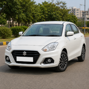 Used Maruti Suzuki Dzire white sedan front view parked on a clean road